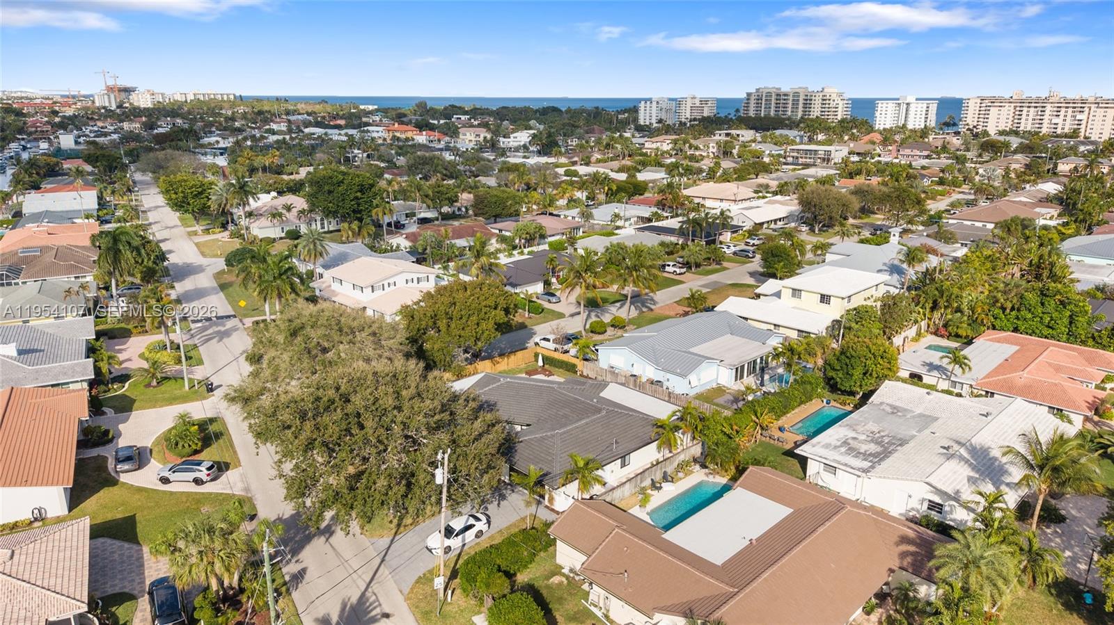 3910 Northeast 27th Terrace Lighthouse Point, FL 33064 - Photo 53 of 55 an aerial view of residential houses with outdoor space