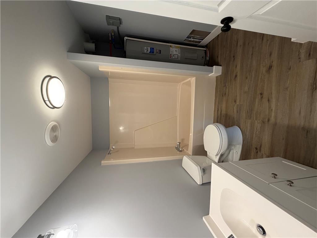 19 Springridge Road Bath, PA 18014 - Photo 23 of 29 Smooth walls and classic wood flooring define this functional bathroom space.