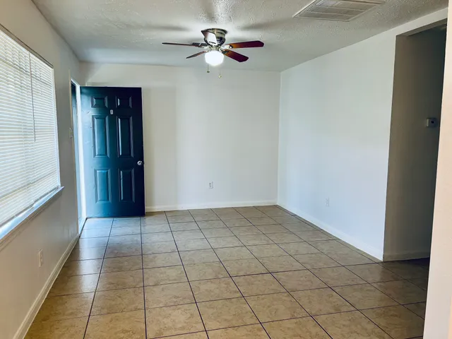 a kitchen with a stove and a microwave