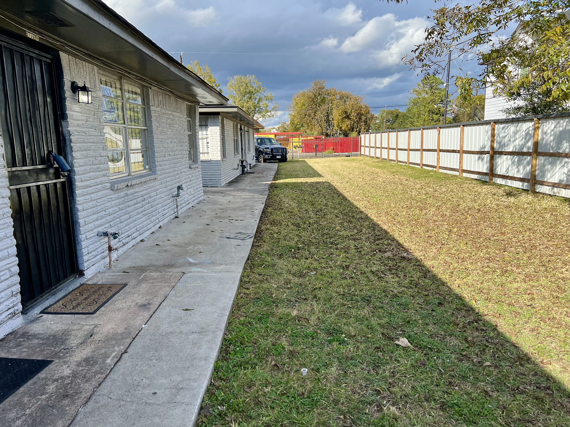 5136 Mallow Street, Unit B Houston, TX 77033 - Photo 2 of 14 a view of swimming pool with a yard