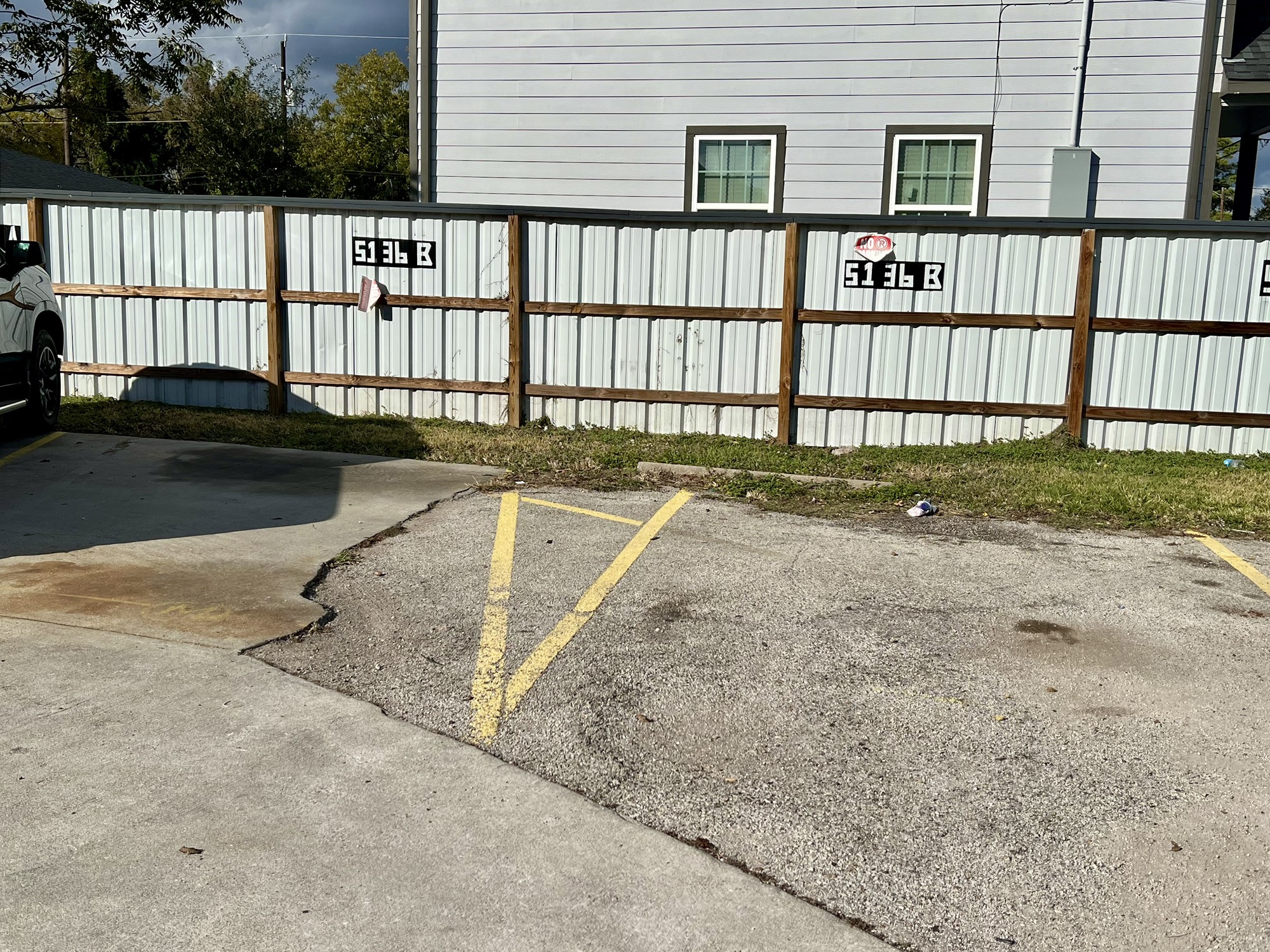 5136 Mallow Street, Unit B Houston, TX 77033 - Photo 3 of 14 a view of a house with backyard and porch