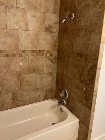 a bathroom with a bathtub