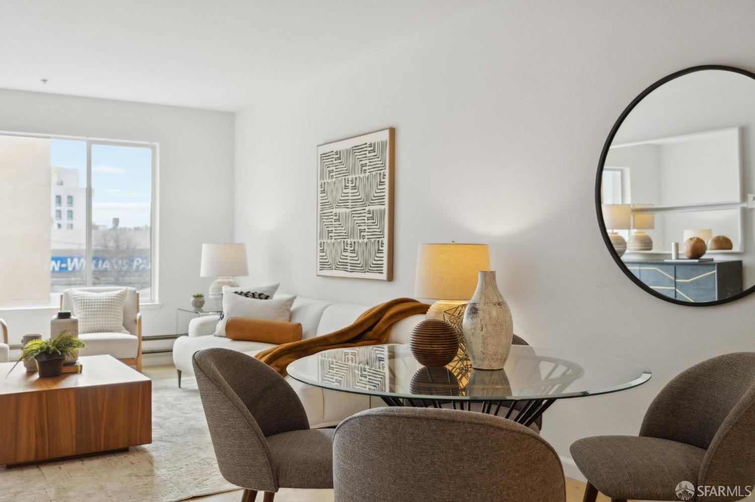 550 South Van Ness Avenue, Unit 207 San Francisco, CA 94110 - Photo 13 of 22 a living room with furniture and a mirror