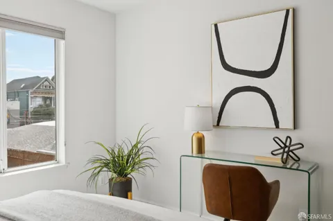 a bathroom with a tub shower and sink