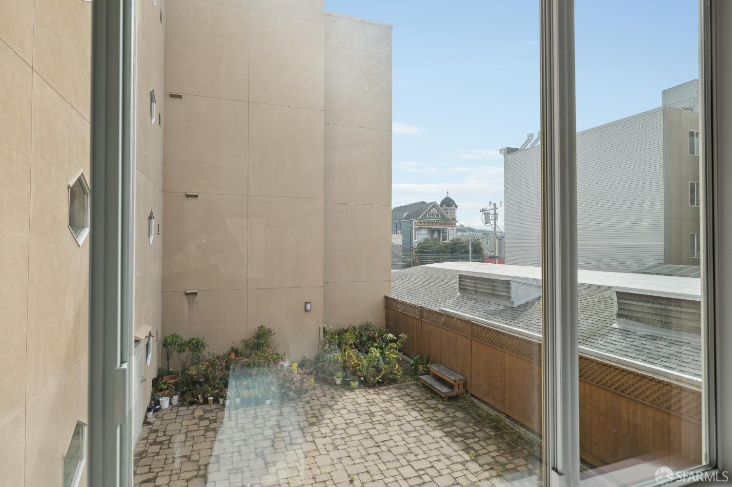 550 South Van Ness Avenue, Unit 207 San Francisco, CA 94110 - Photo 19 of 22 a bathroom with a tub shower and sink