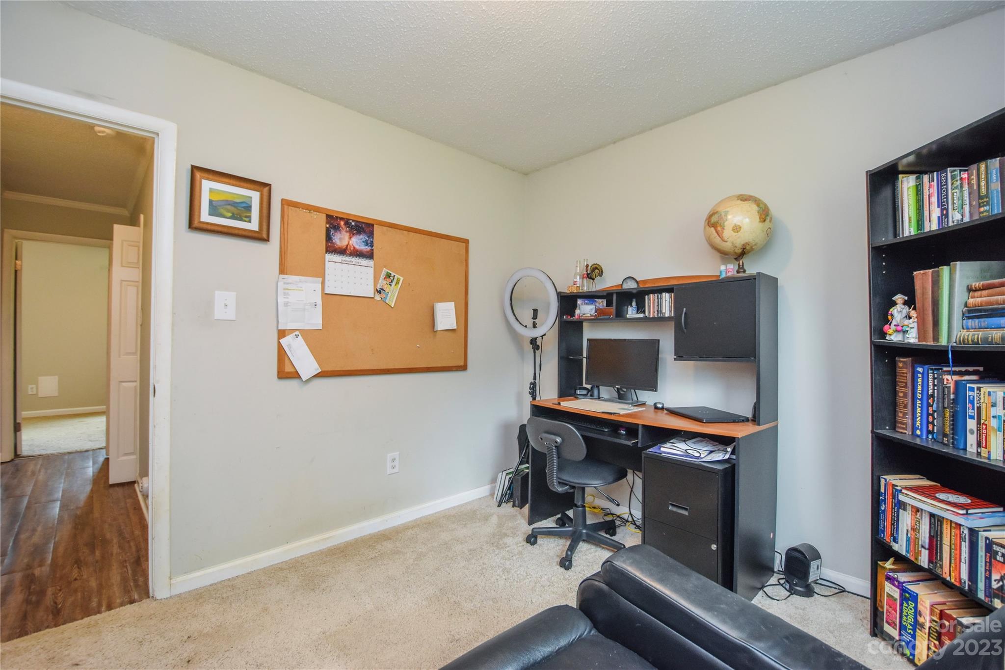 204 Springhill Lane Maiden, NC 28650 - Photo 12 of 20 a room with furniture and a book shelf