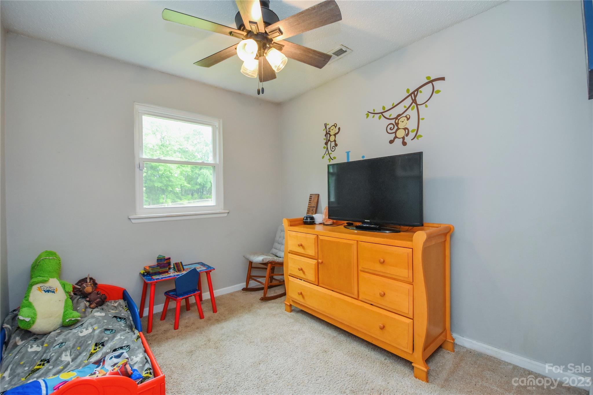 204 Springhill Lane Maiden, NC 28650 - Photo 14 of 20 a bedroom with a bed and wooden floor