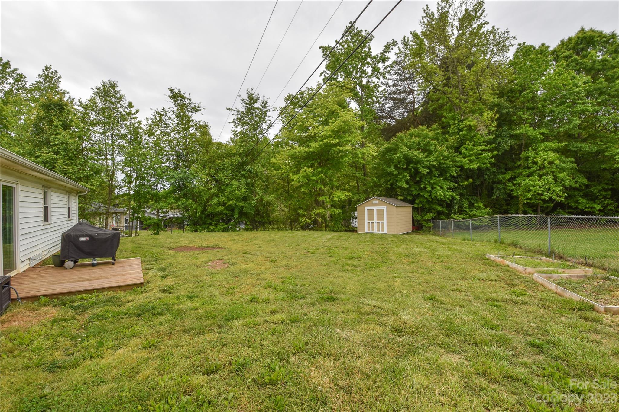 204 Springhill Lane Maiden, NC 28650 - Photo 18 of 20 a backyard of a house with lots of green space