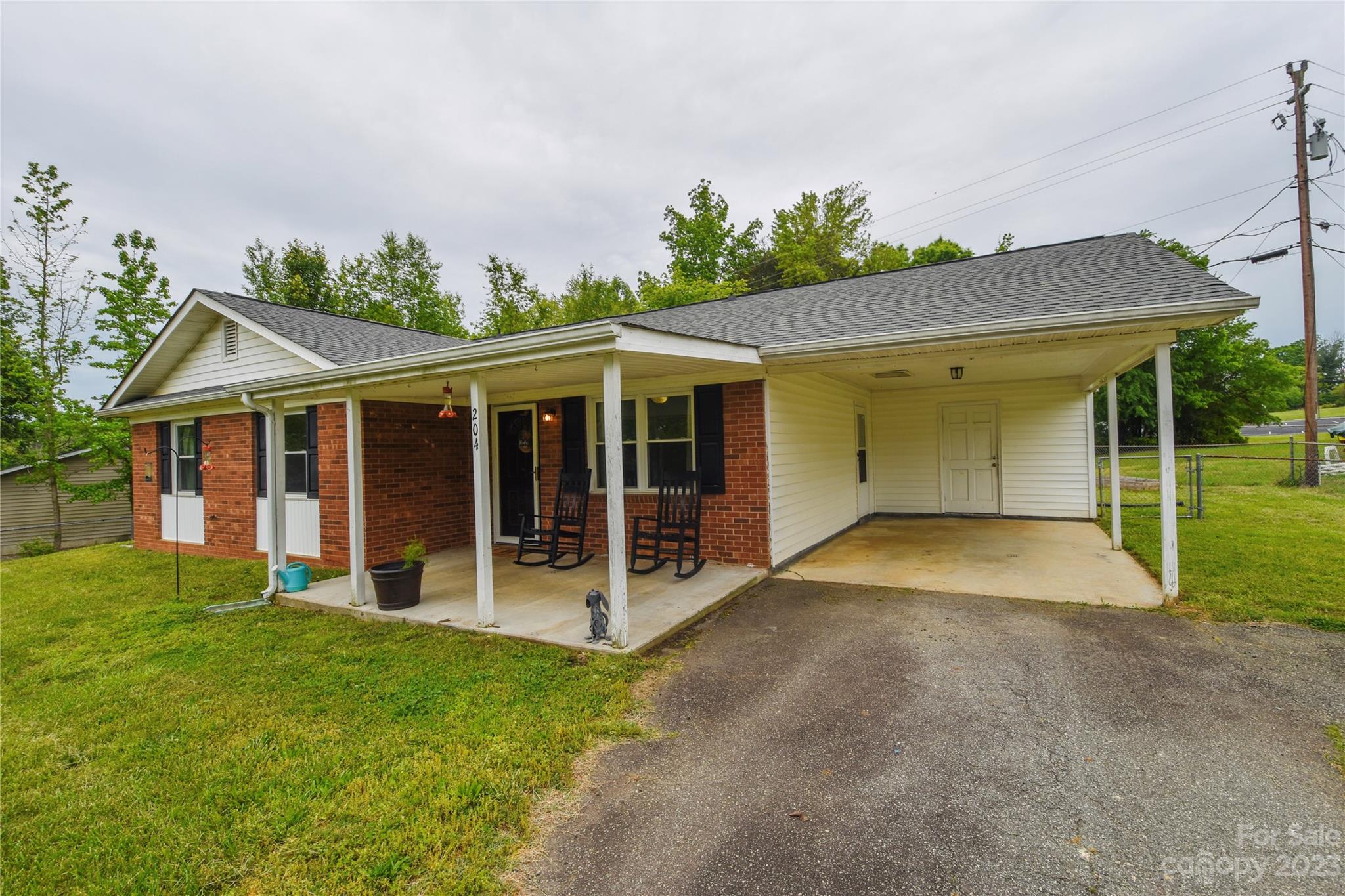 204 Springhill Lane Maiden, NC 28650 - Photo 3 of 20 front view of a house with a yard