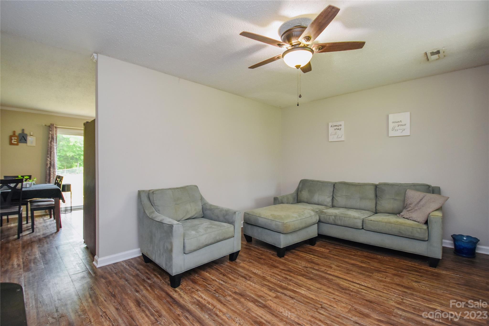 204 Springhill Lane Maiden, NC 28650 - Photo 6 of 20 a living room with furniture and a wooden floor