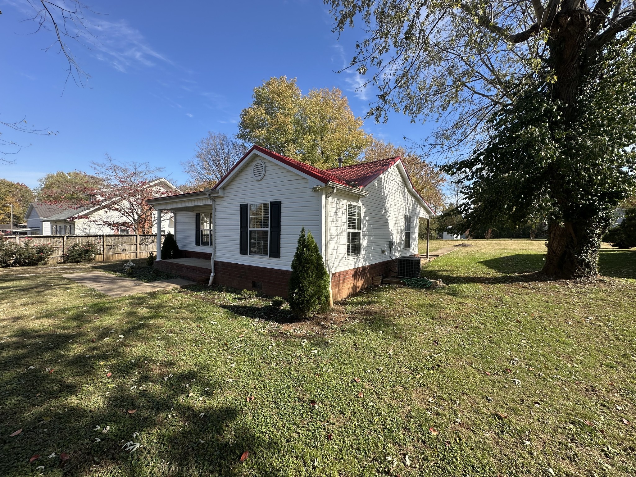 902 South Russell Street Portland, TN 37148 - Photo 3 of 13 a view of a house with a yard