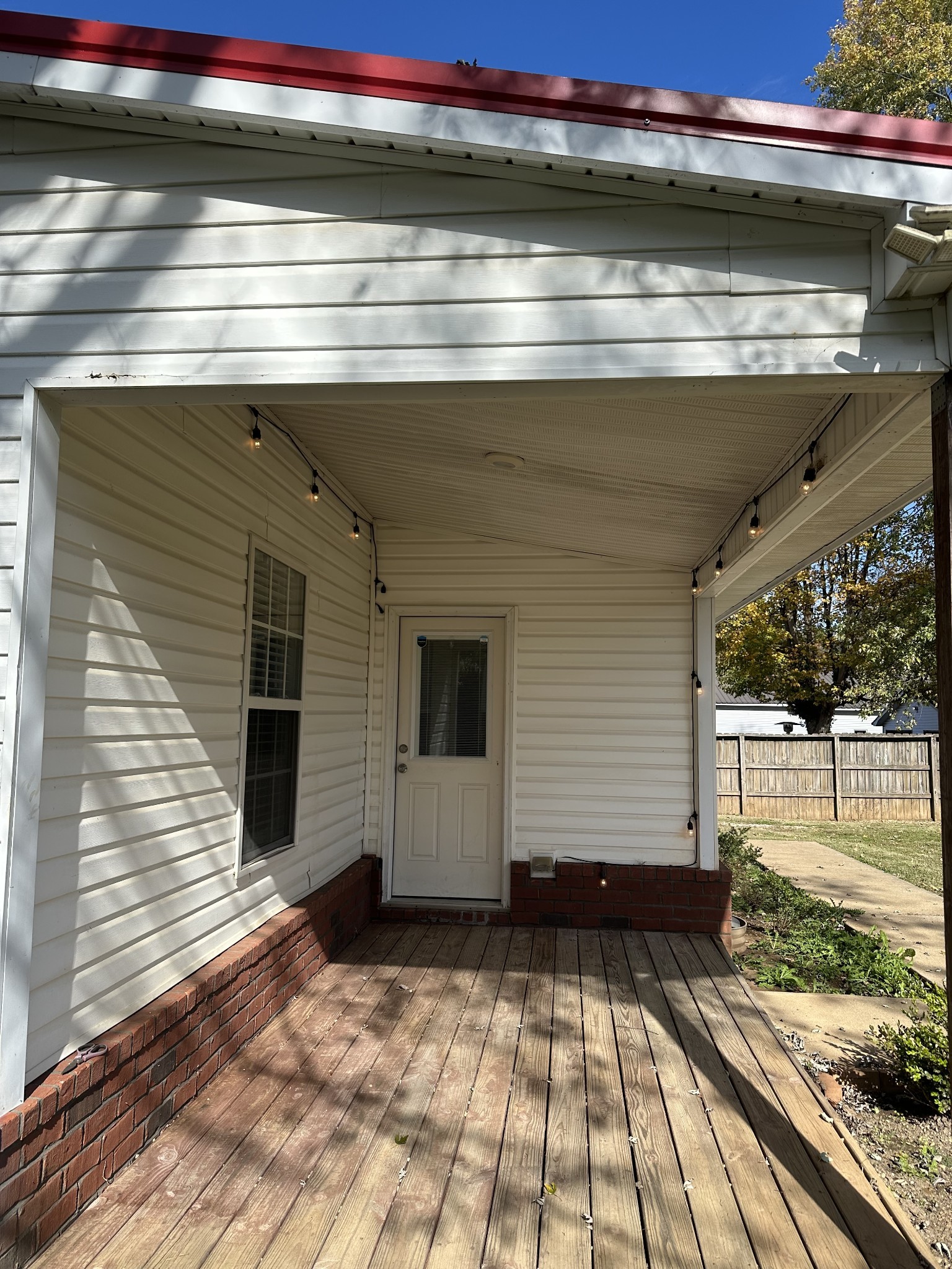 902 South Russell Street Portland, TN 37148 - Photo 6 of 13 a view of backyard with wooden deck