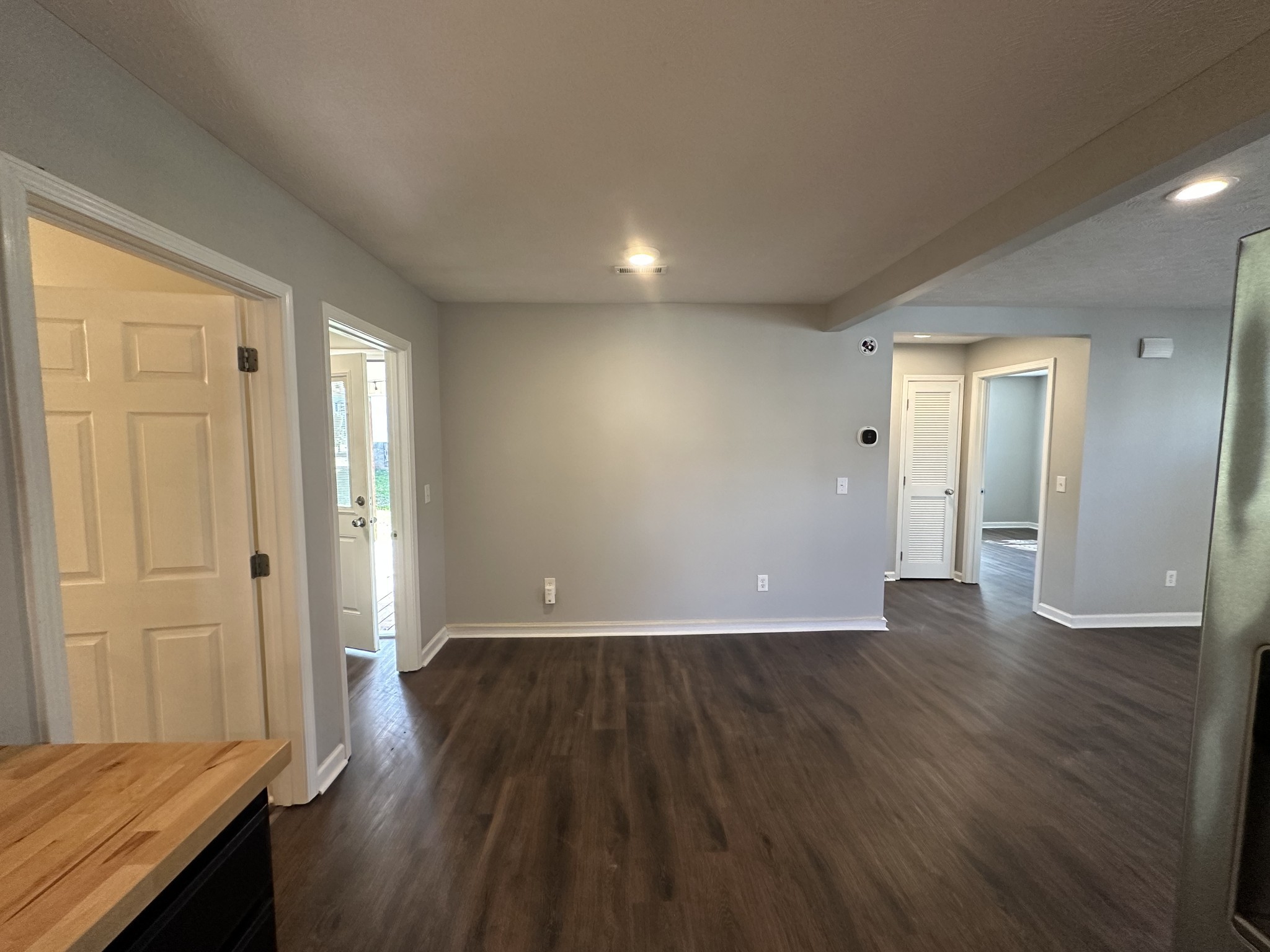 902 South Russell Street Portland, TN 37148 - Photo 9 of 13 wooden floor in an empty room with a window