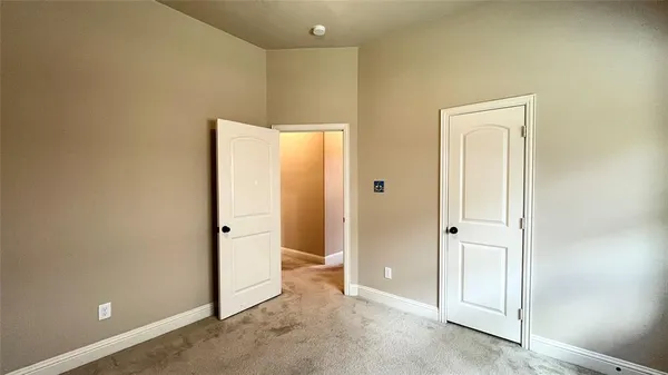 an empty room with a door