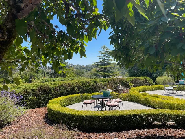 a view of a swimming pool with a yard