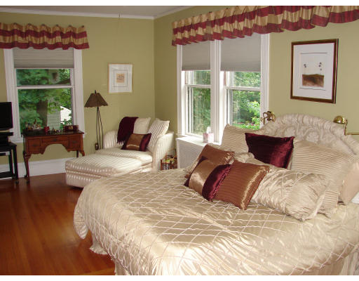 28 Westbourne Road Newton, MA 02459 - Photo 12 of 20 a bed sitting in a bedroom next to a window