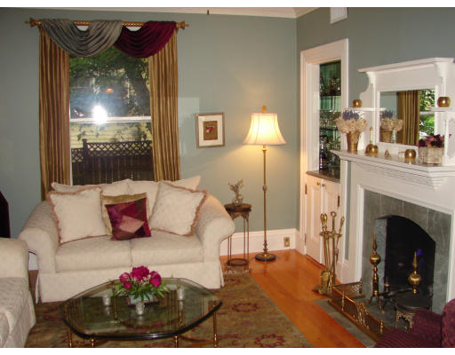 28 Westbourne Road Newton, MA 02459 - Photo 7 of 20 a living room with furniture and a fireplace