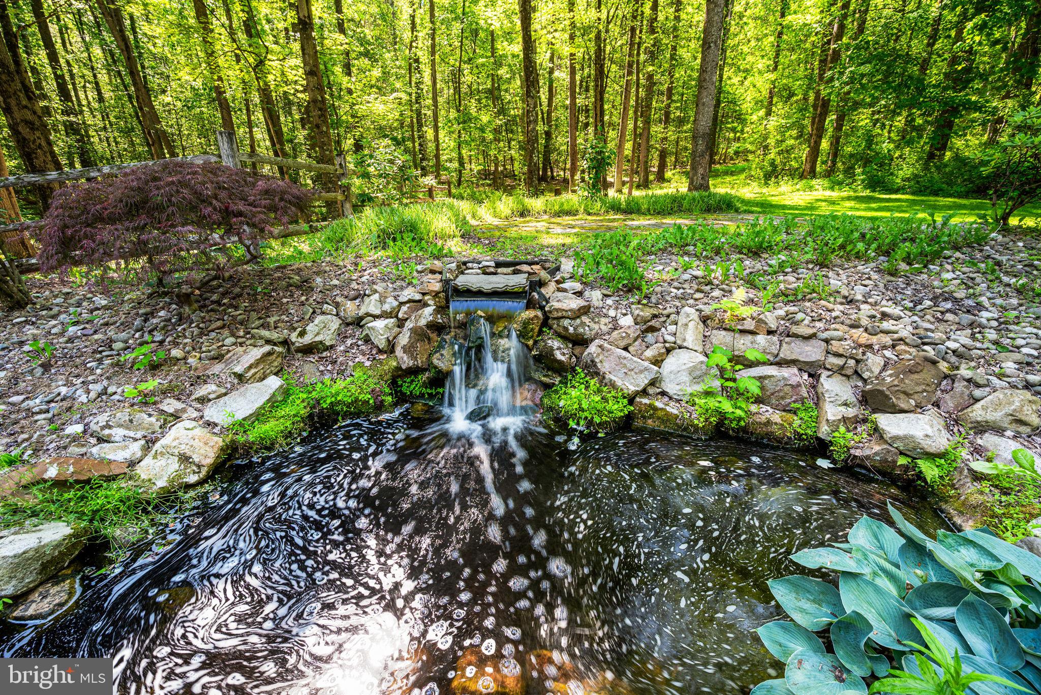 59 Hopewell Road Elverson, PA 19520 - Photo 32 of 50 Fountain & Pond off the Back Deck