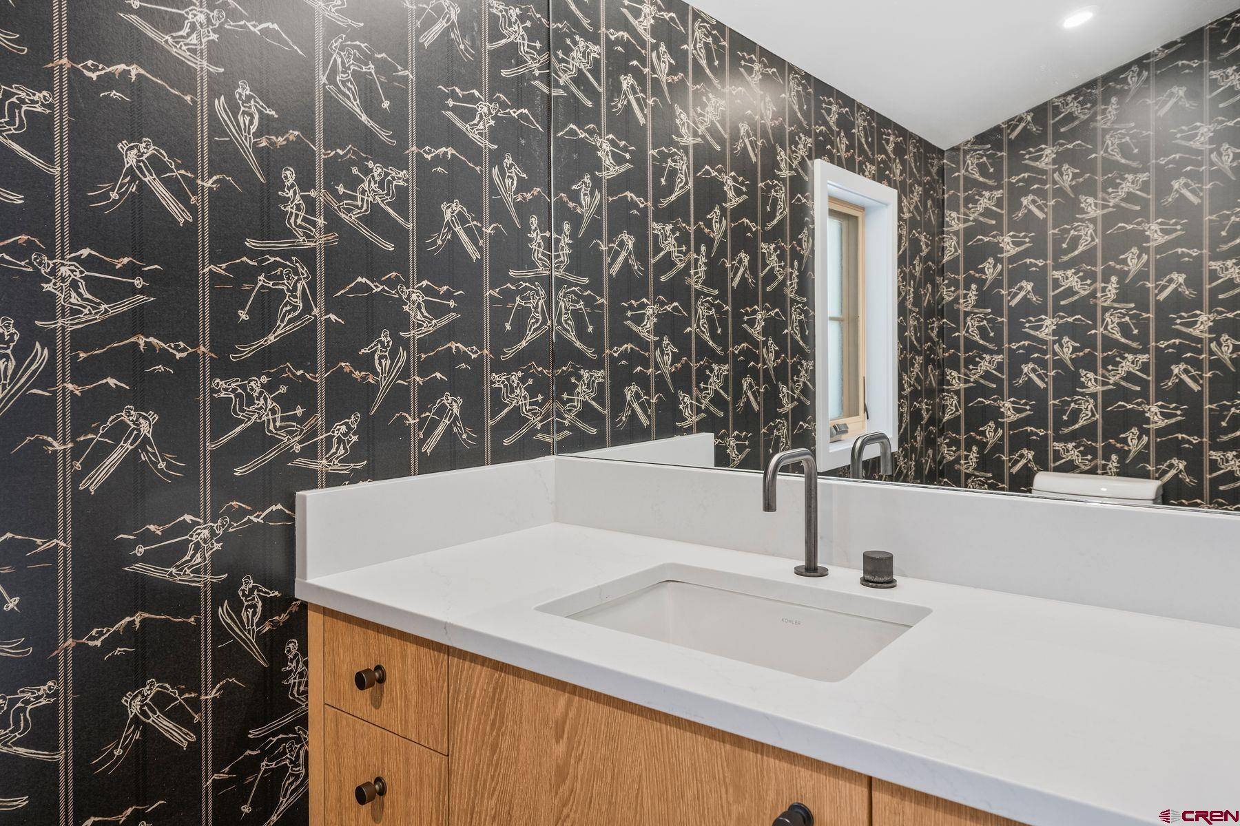 304 2nd Street Crested Butte, CO 81224 - Photo 11 of 37 a bathroom with a sink and a mirror