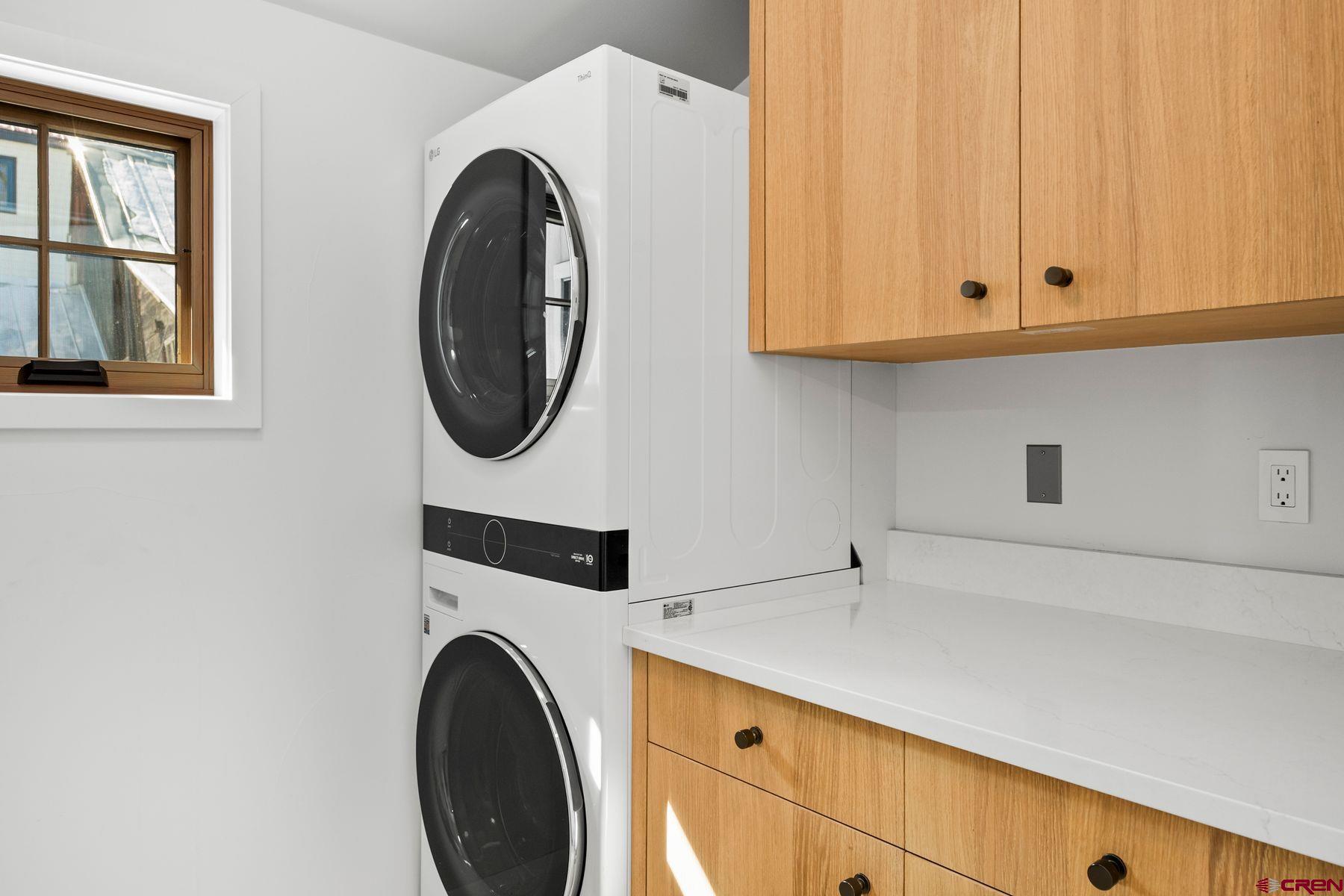 304 2nd Street Crested Butte, CO 81224 - Photo 12 of 37 a utility room with dryer and washer