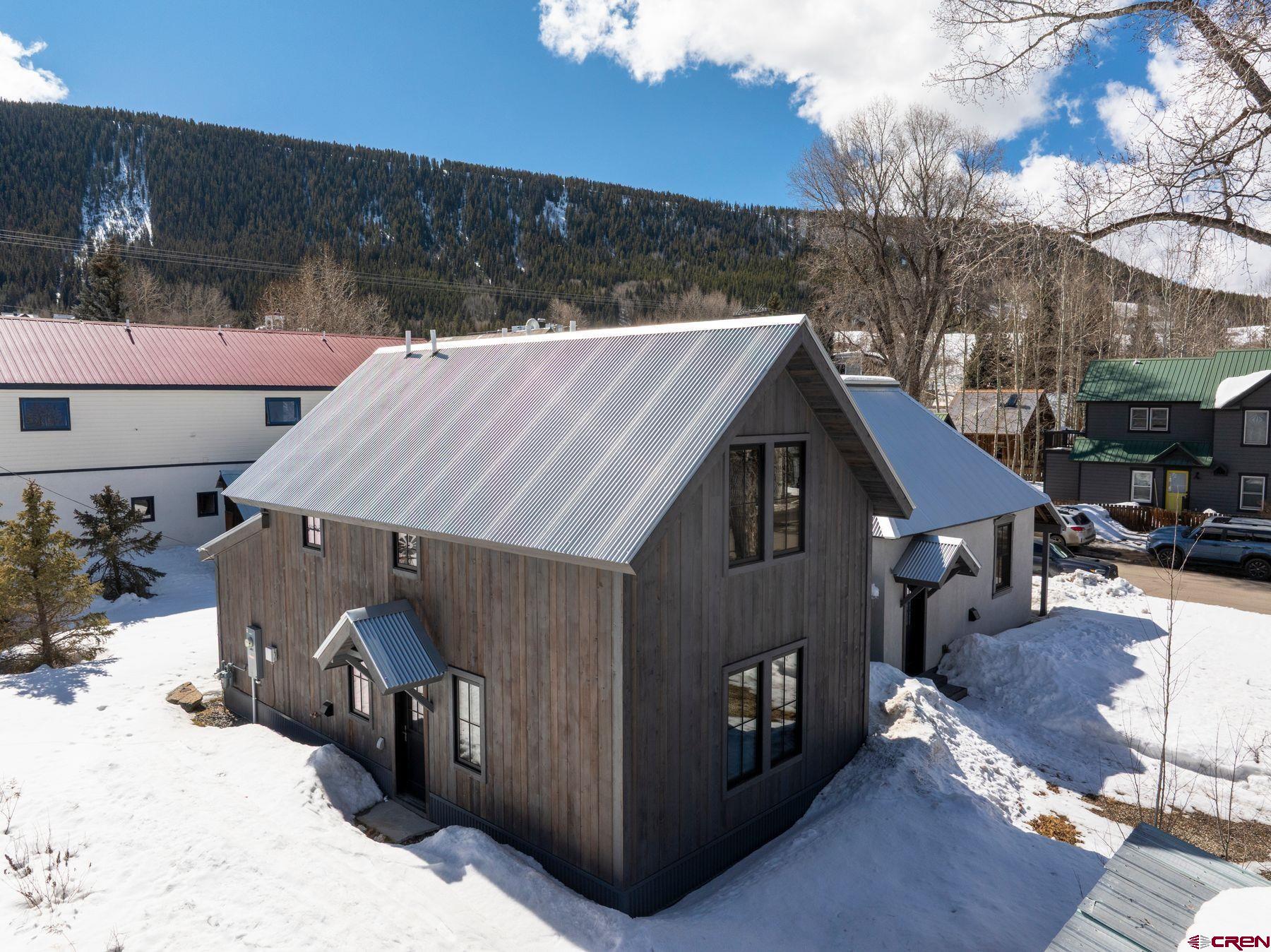 304 2nd Street Crested Butte, CO 81224 - Photo 28 of 37 a view of a house with wooden fence