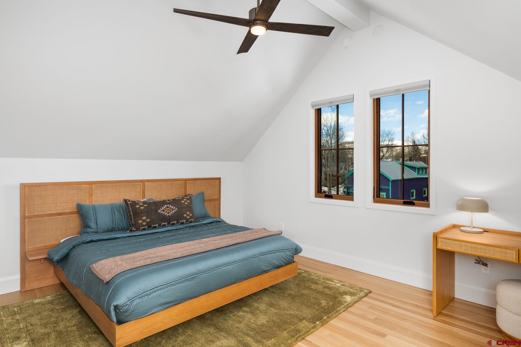 304 2nd Street Crested Butte, CO 81224 - Photo 5 of 37 a bedroom with a bed and window