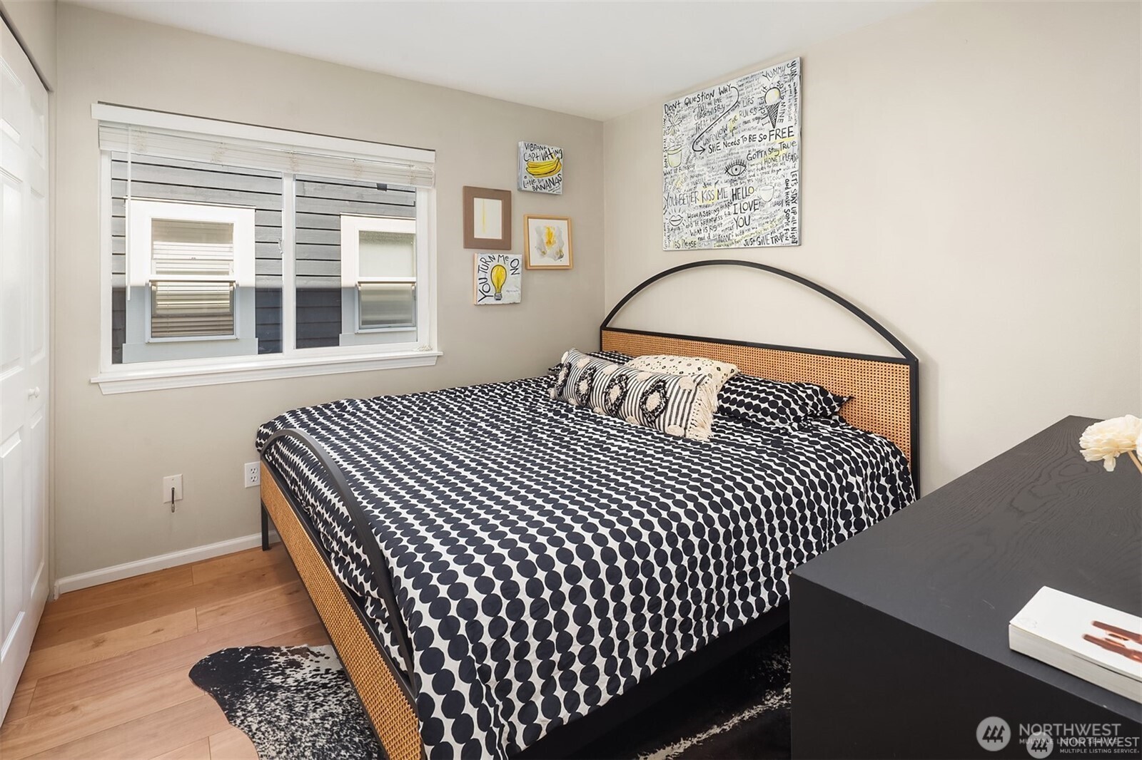 2116 California Avenue Southwest, Unit 201 Seattle, WA 98116 - Photo 20 of 33 a bedroom with a bed and a window