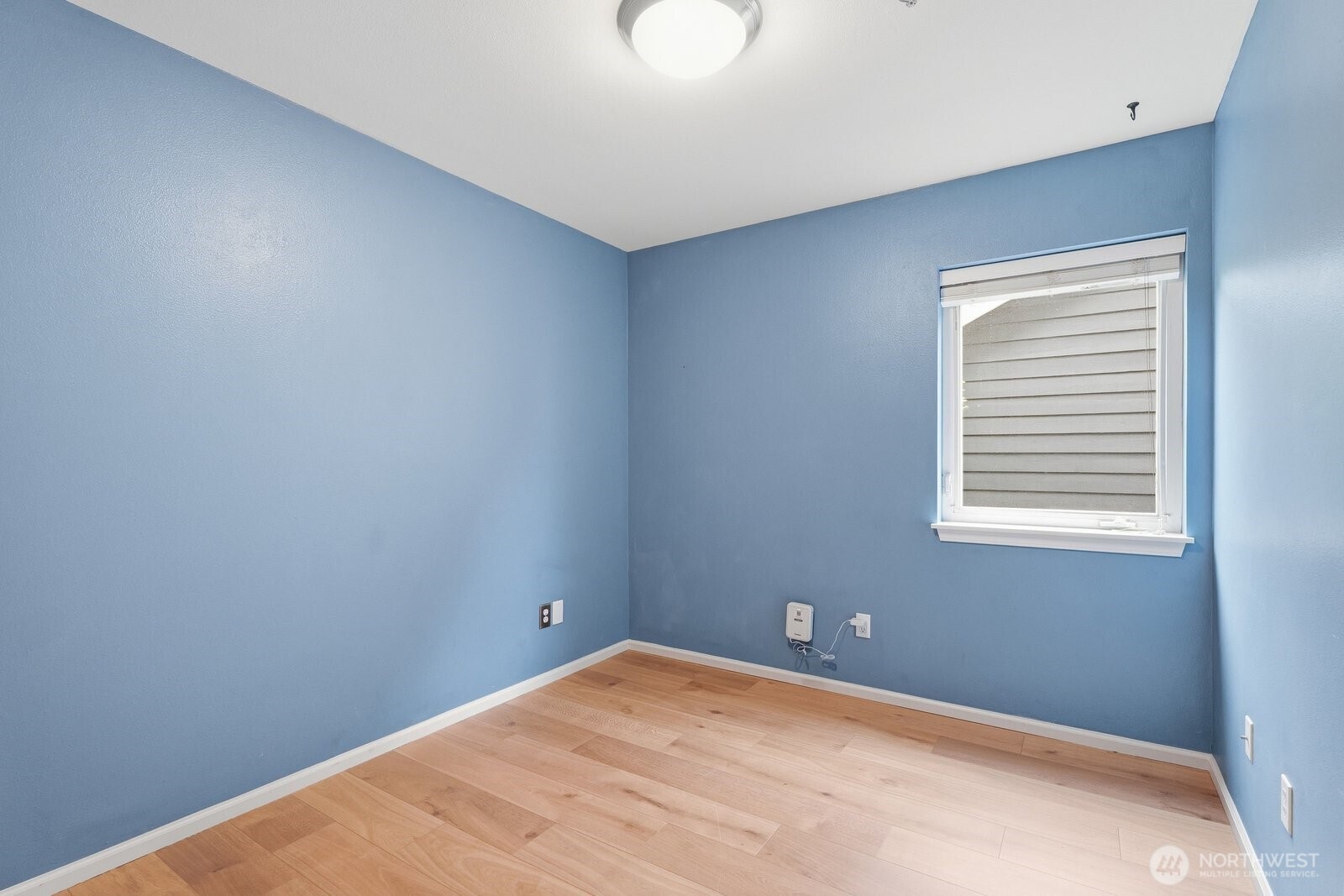 2116 California Avenue Southwest, Unit 201 Seattle, WA 98116 - Photo 21 of 33 a view of a room that has a window in it