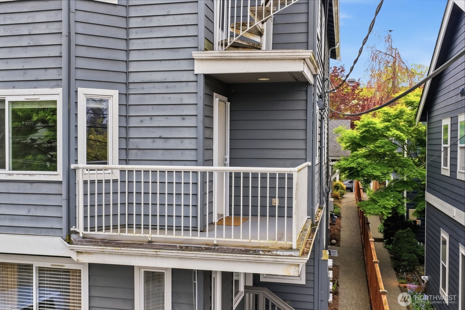 2116 California Avenue Southwest, Unit 201 Seattle, WA 98116 - Photo 29 of 33 a view of a brick house with a large window