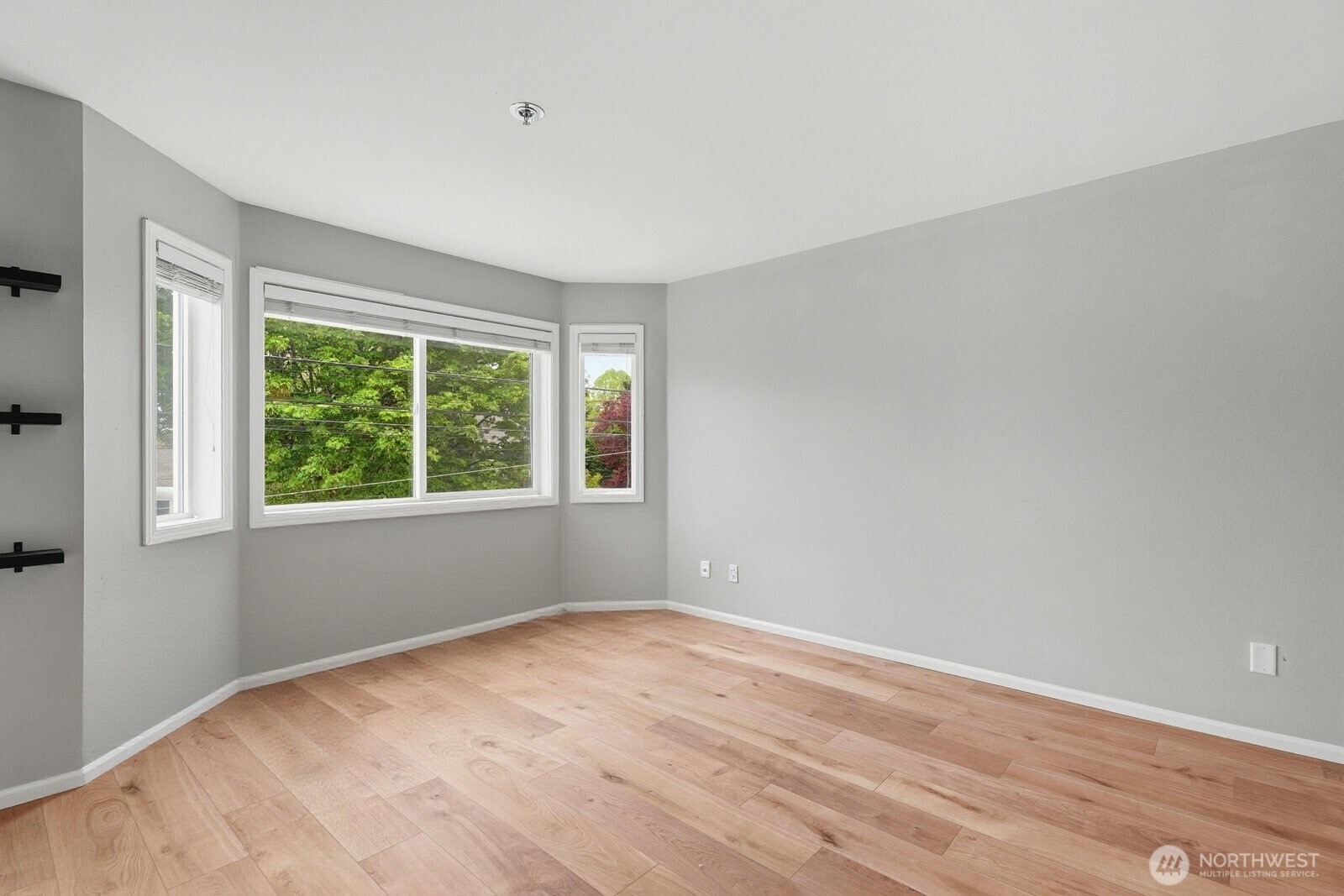 2116 California Avenue Southwest, Unit 201 Seattle, WA 98116 - Photo 6 of 33 a view of empty room with window
