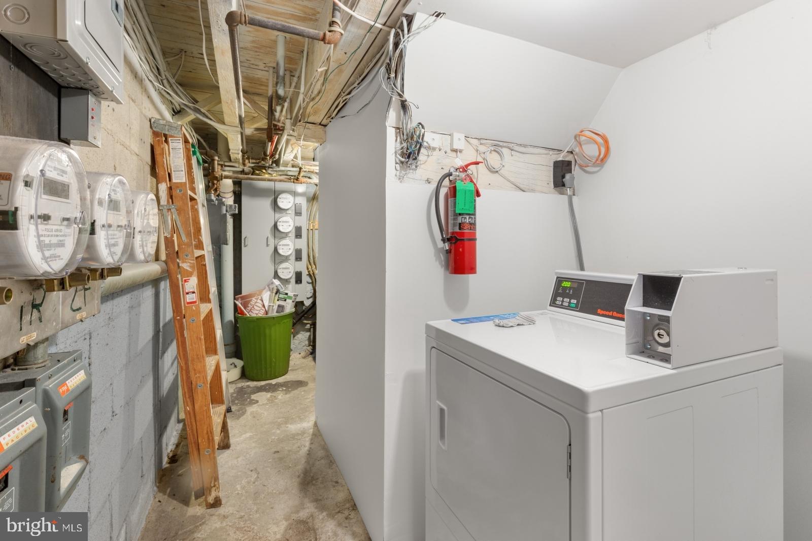 515 South 6th Street, Unit 1R Philadelphia, PA 19147 - Photo 13 of 17 a utility room with dryer and washer