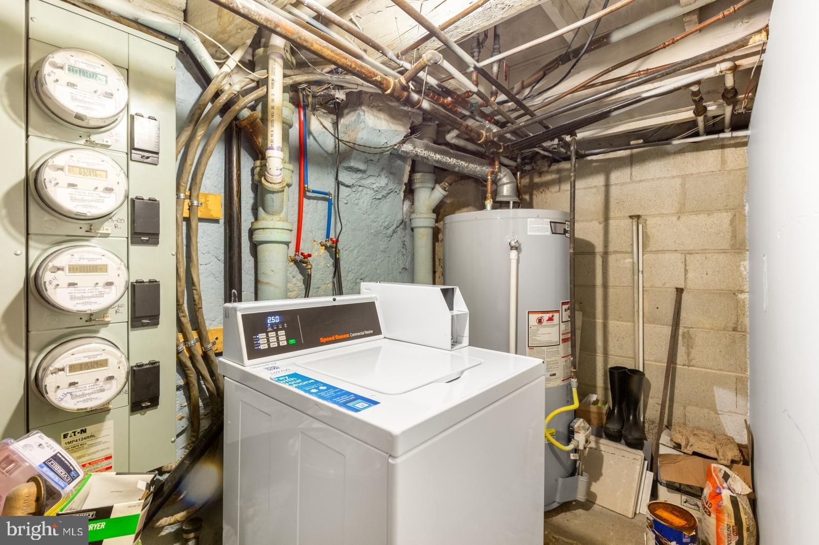 515 South 6th Street, Unit 1R Philadelphia, PA 19147 - Photo 14 of 17 a utility room with dryer and washer