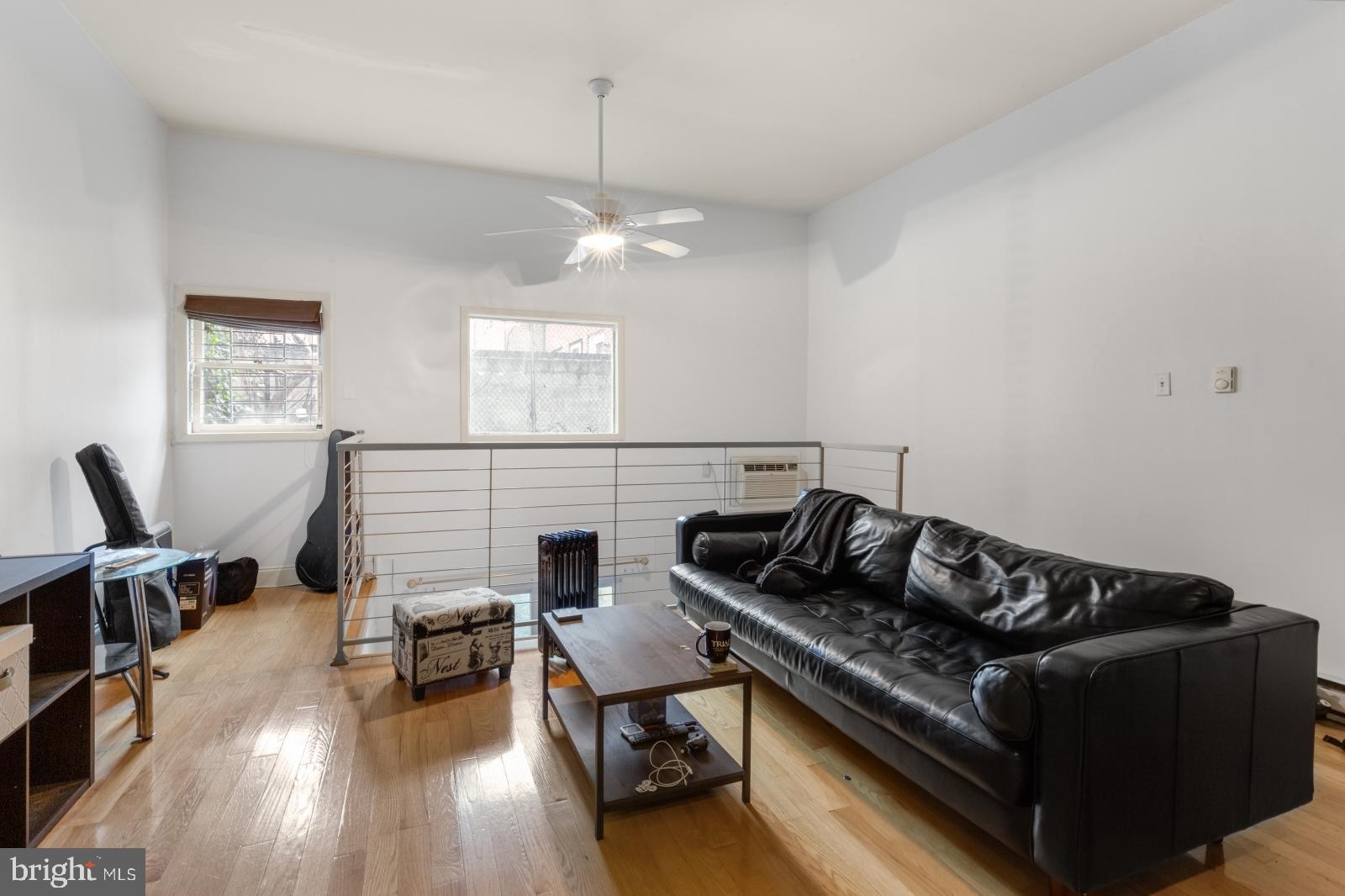 515 South 6th Street, Unit 1R Philadelphia, PA 19147 - Photo 3 of 17 a living room with furniture