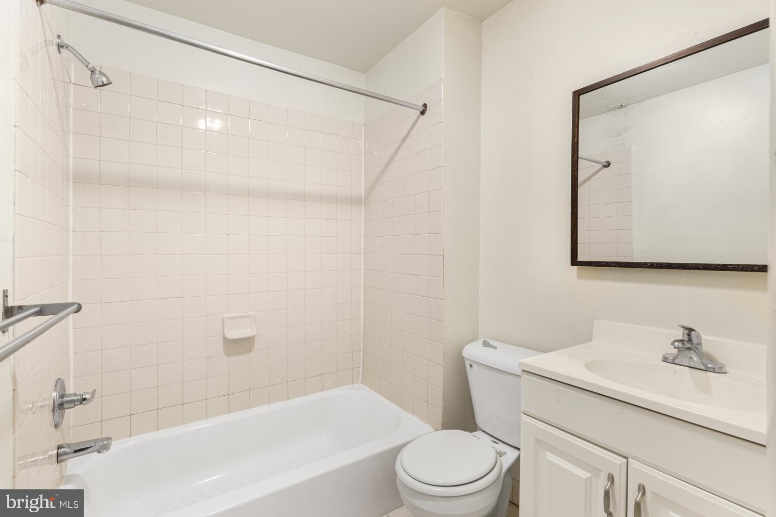 515 South 6th Street, Unit 1R Philadelphia, PA 19147 - Photo 6 of 17 a bathroom with a sink toilet and shower