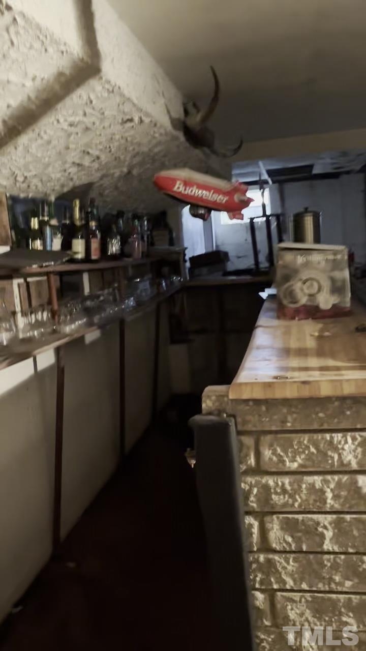 610 Flemingtown Road Henderson, NC 27537 - Photo 13 of 14 a room with storage and utility room