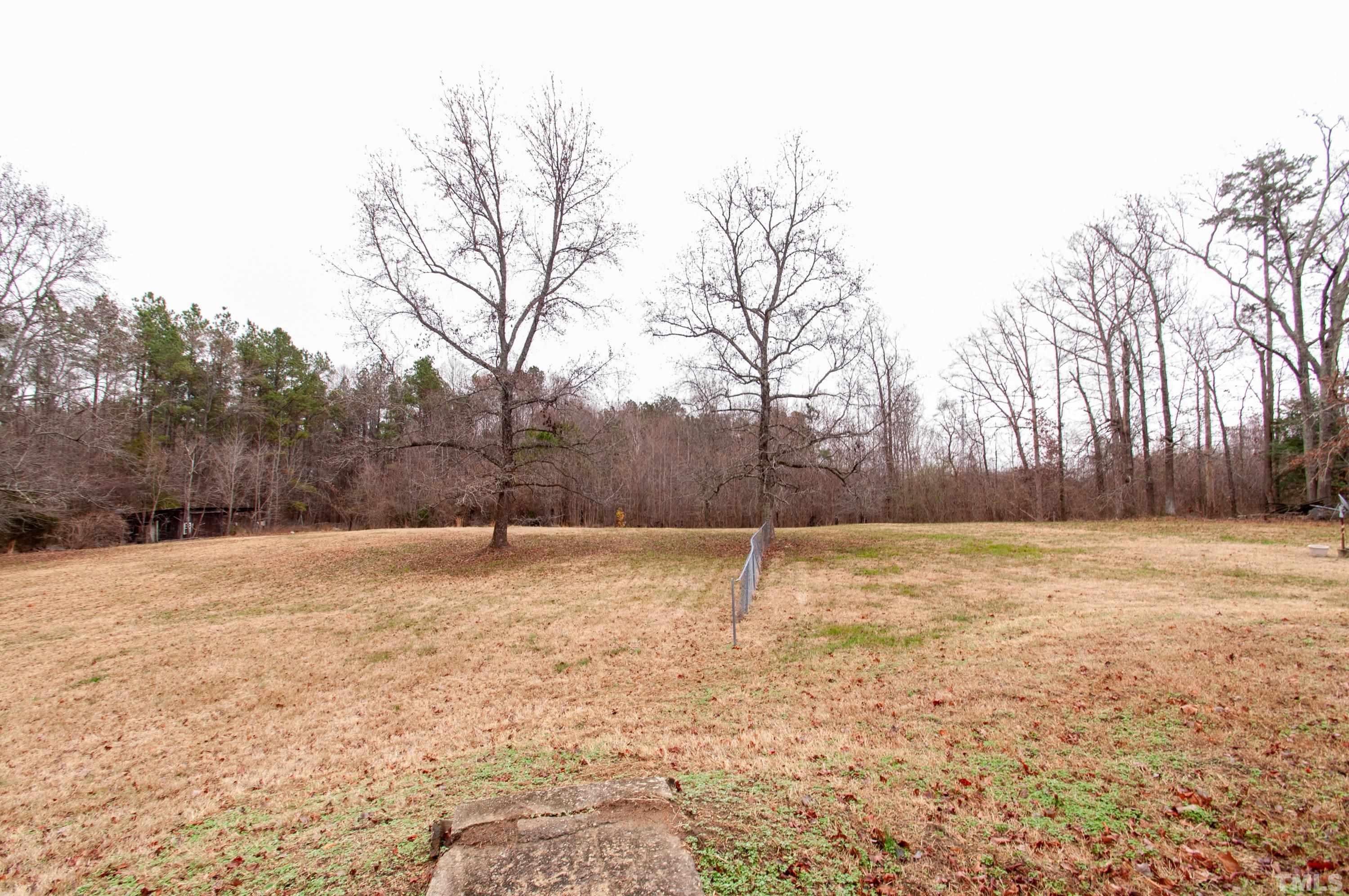 610 Flemingtown Road Henderson, NC 27537 - Photo 4 of 14 a swimming pool with a yard