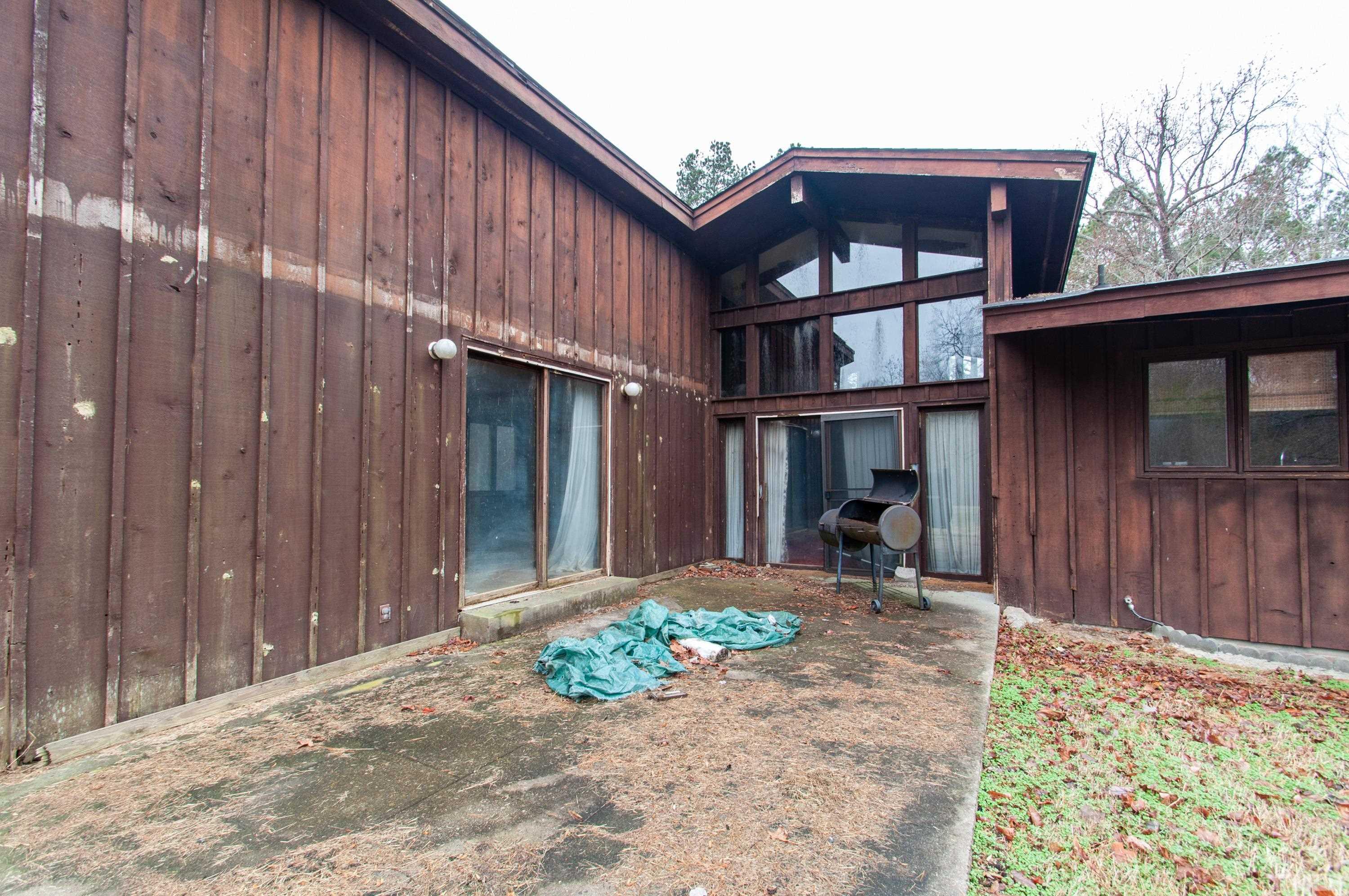 610 Flemingtown Road Henderson, NC 27537 - Photo 5 of 14 a front view of a house with garden