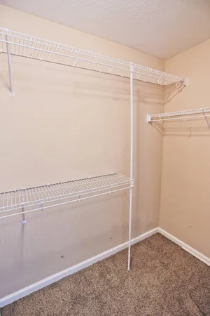 a view of a room with racks on the wall