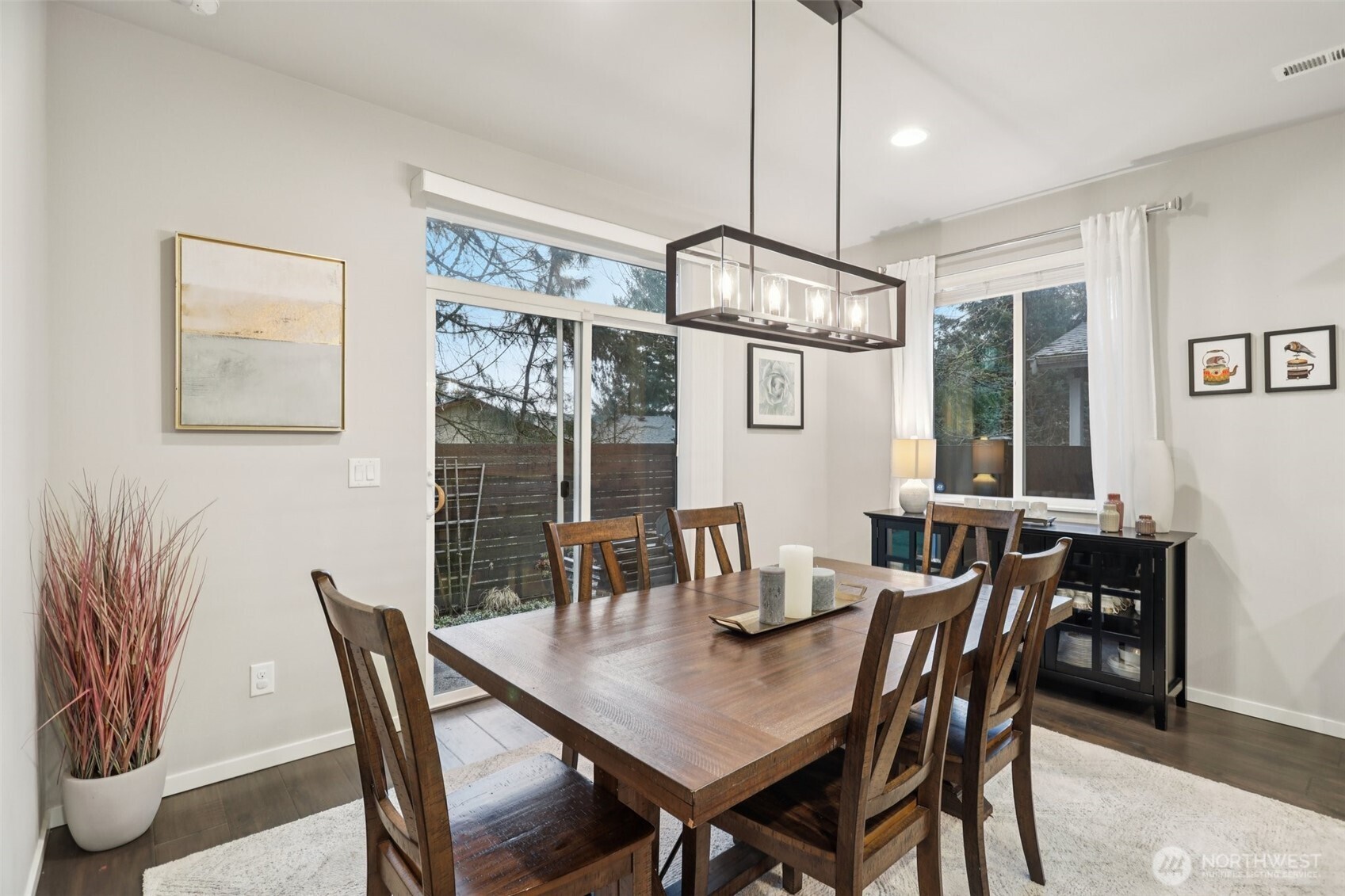 18533 115th Place Southeast Renton, WA 98055 - Photo 12 of 30 a view of a dining room with furniture window and wooden floor