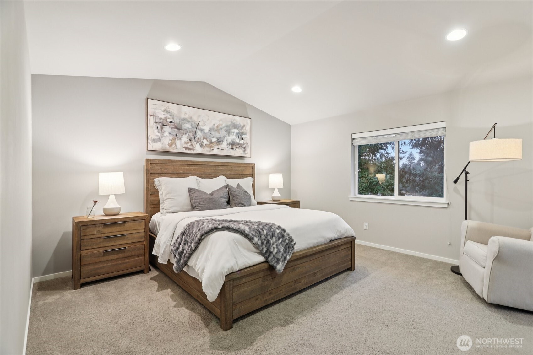 18533 115th Place Southeast Renton, WA 98055 - Photo 17 of 30 a spacious bedroom with a bed and a window