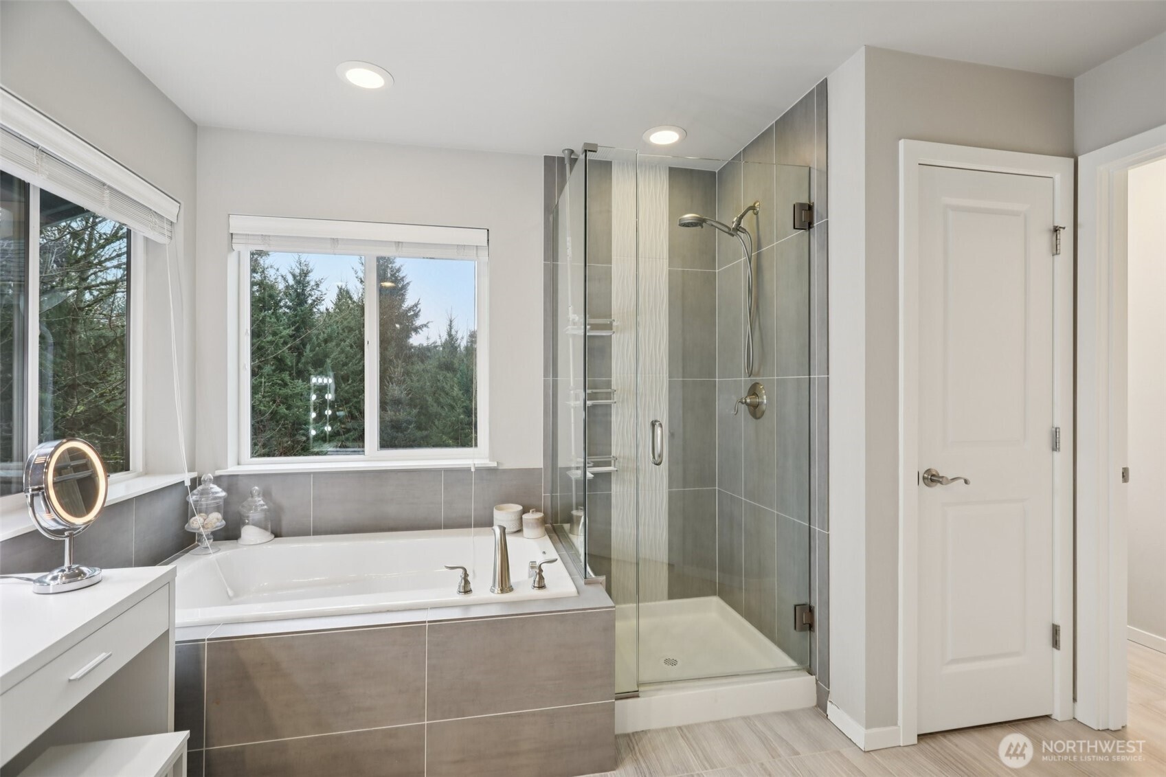 18533 115th Place Southeast Renton, WA 98055 - Photo 20 of 30 a spacious bathroom with a tub shower and windows