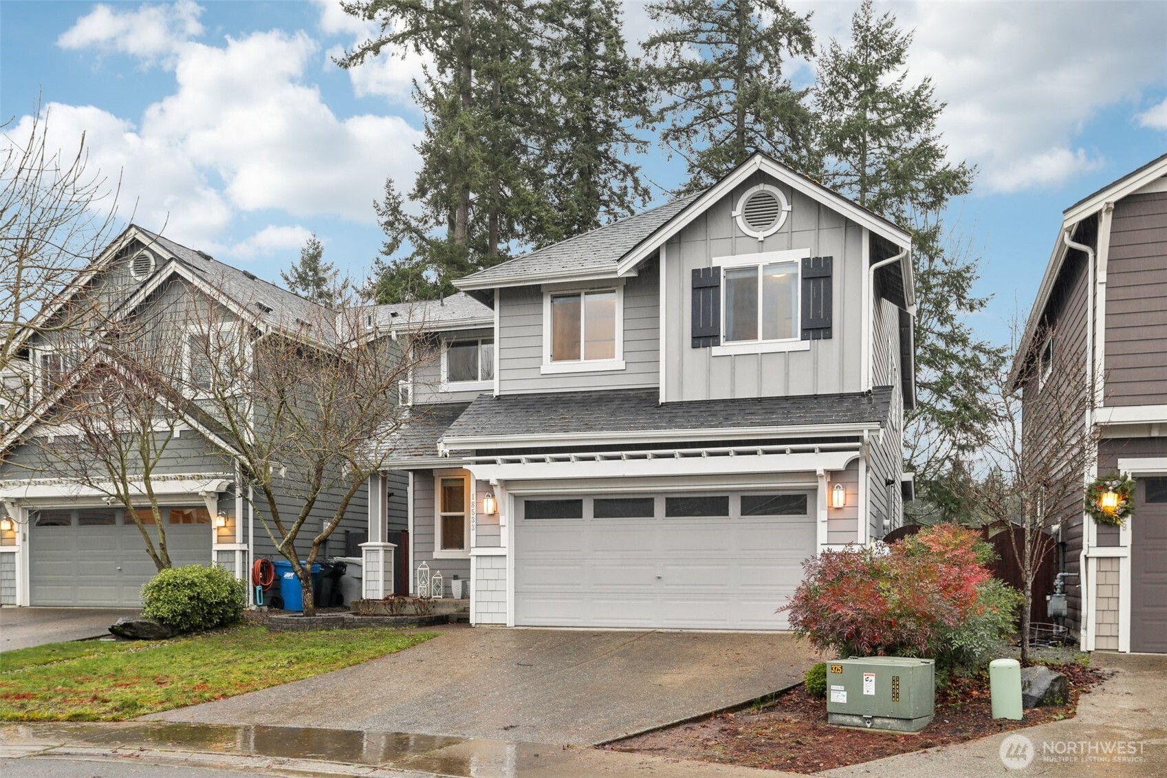 18533 115th Place Southeast Renton, WA 98055 - Photo 2 of 30 a front view of a house with a yard