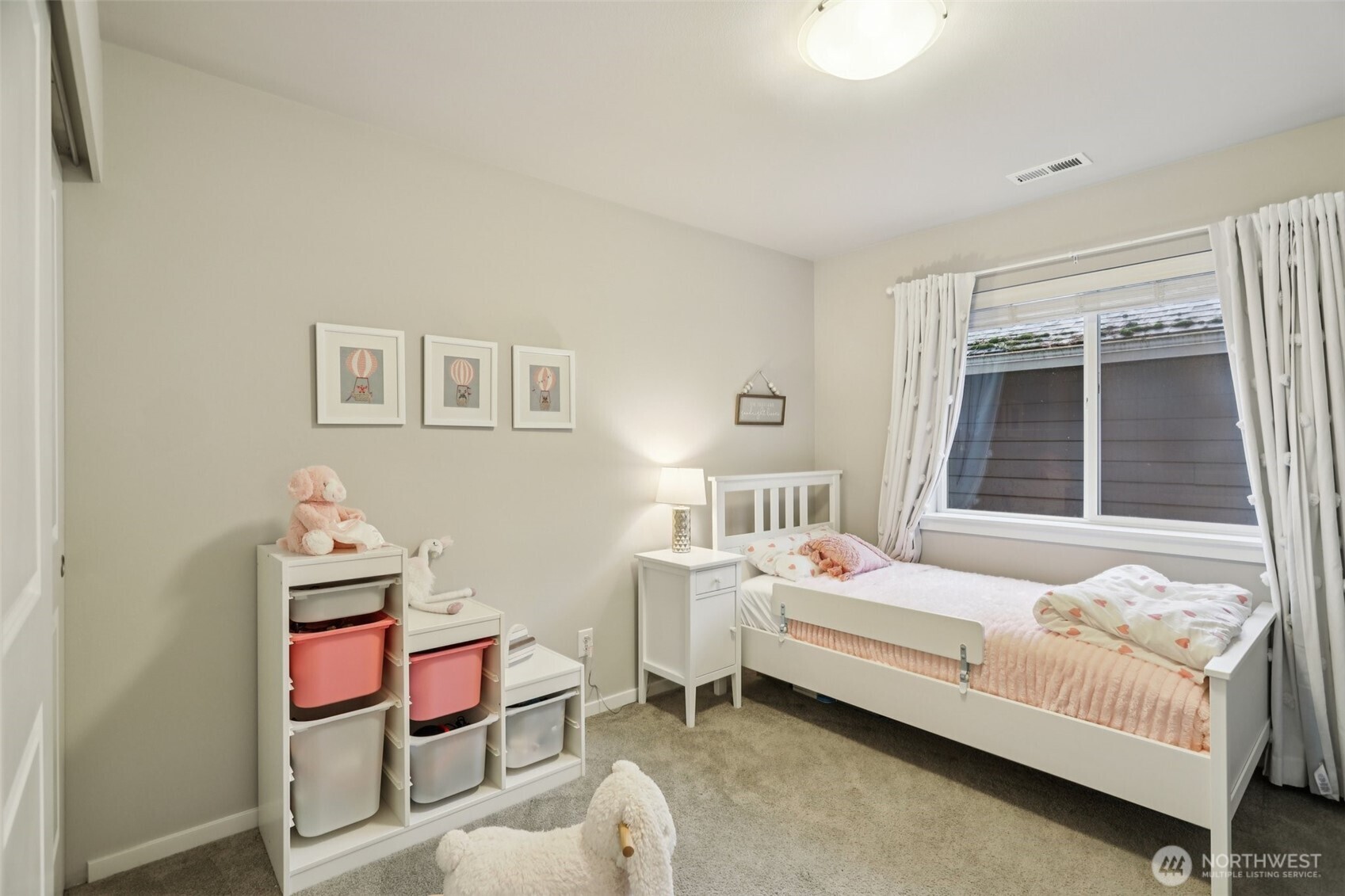 18533 115th Place Southeast Renton, WA 98055 - Photo 21 of 30 a bedroom with a bed and a window