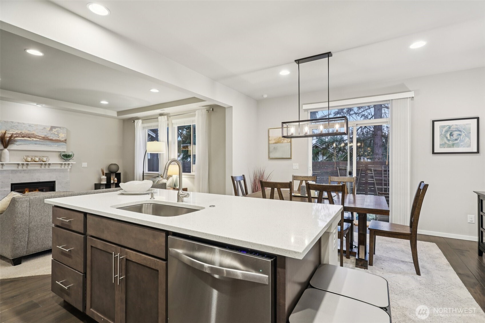18533 115th Place Southeast Renton, WA 98055 - Photo 10 of 30 a kitchen with a table chairs stove and microwave