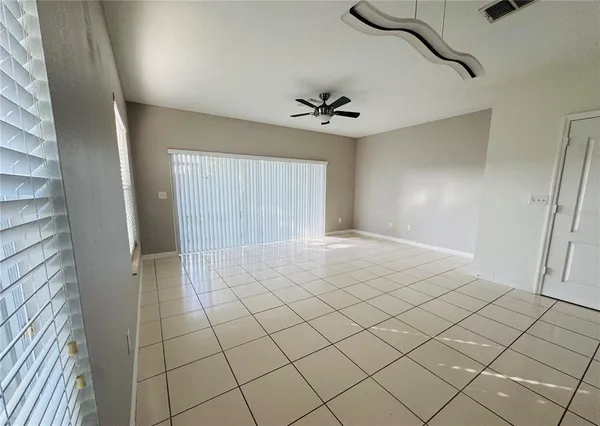 a view of an empty room and window