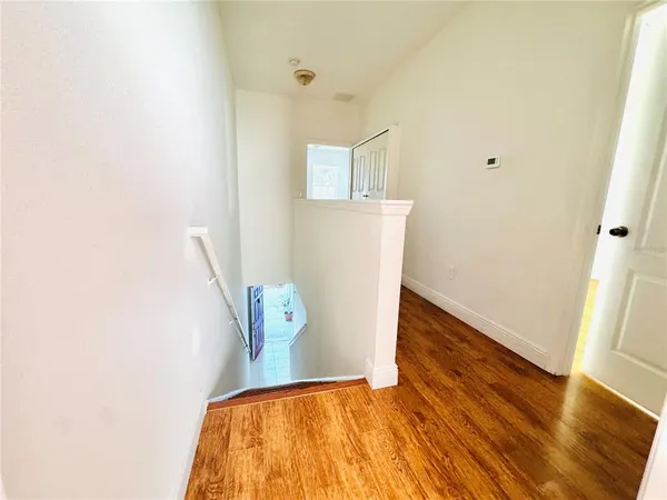 a view of hallway with stairs