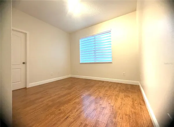 a bathroom with a sink a toilet and a shower
