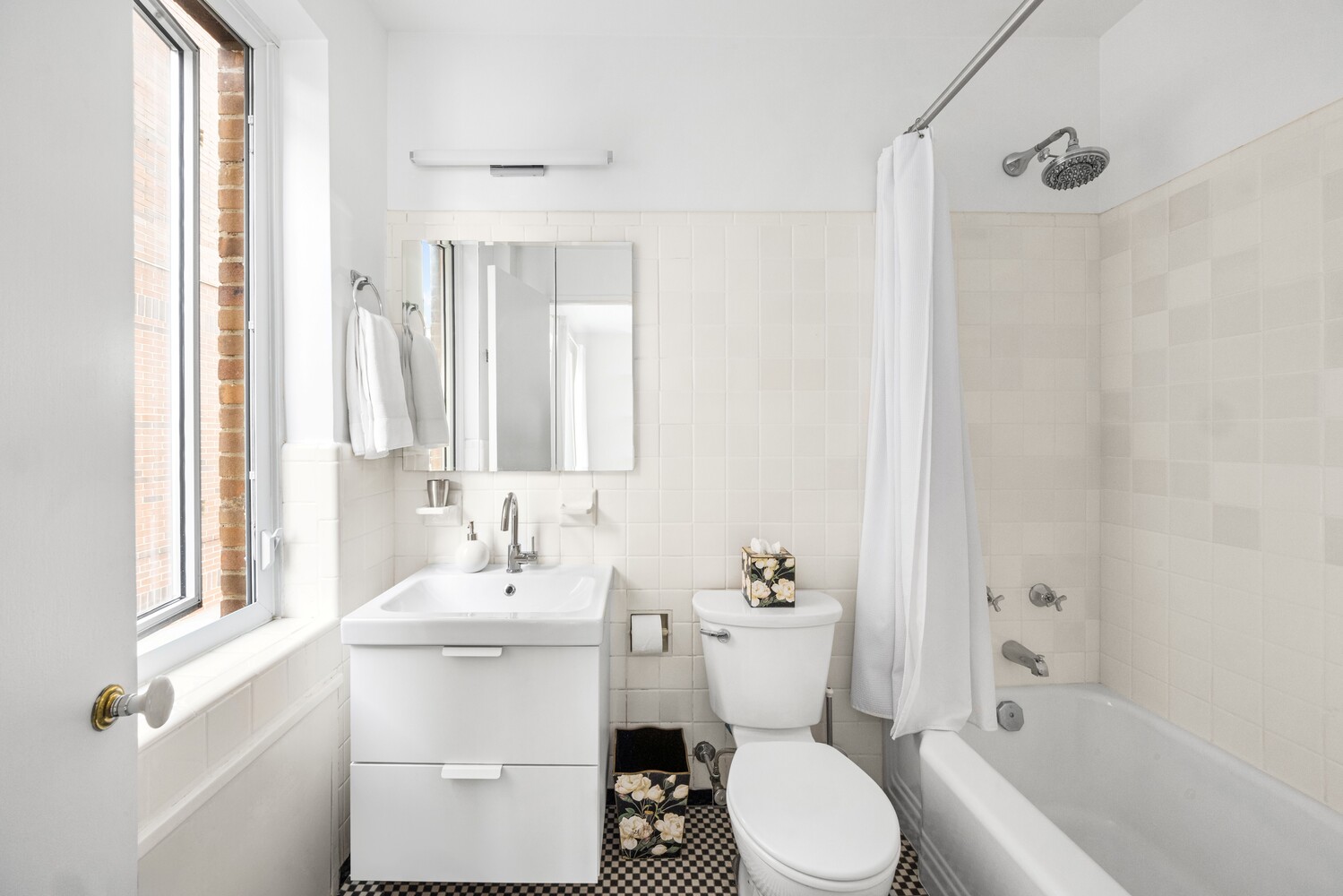 120 East 79th Street, Unit PH20 Manhattan, NY 10075 - Photo 10 of 20 a bathroom with a sink toilet and shower