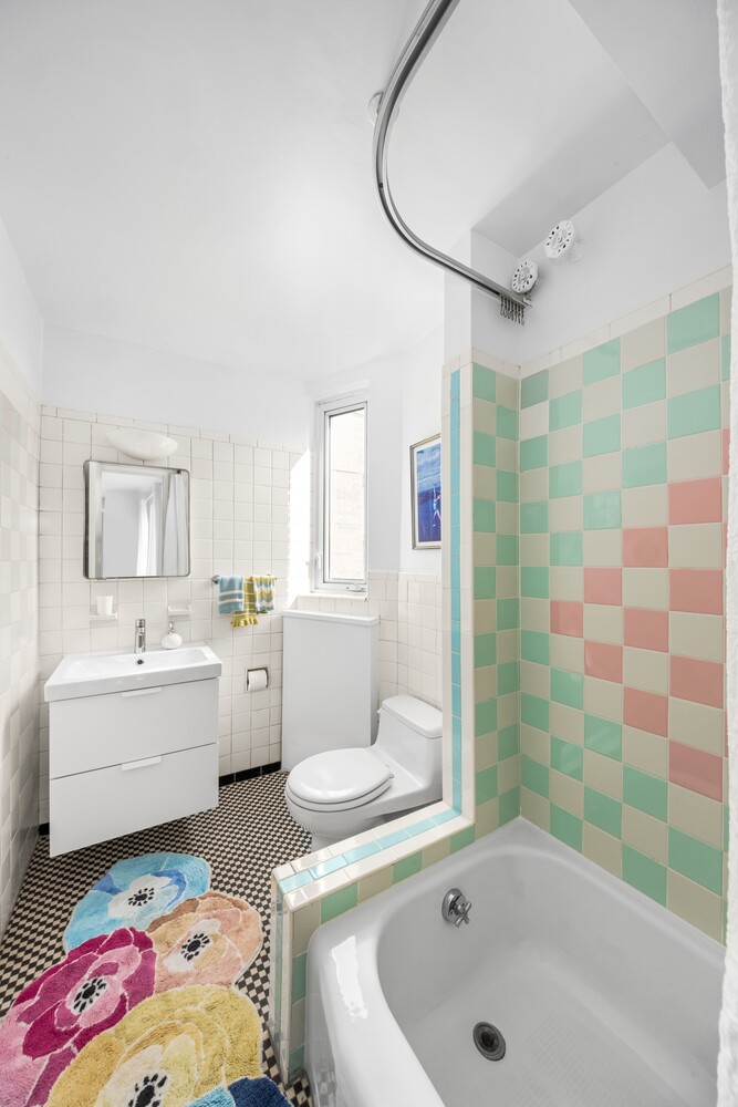 120 East 79th Street, Unit PH20 Manhattan, NY 10075 - Photo 17 of 20 a bathroom with a sink a toilet and shower