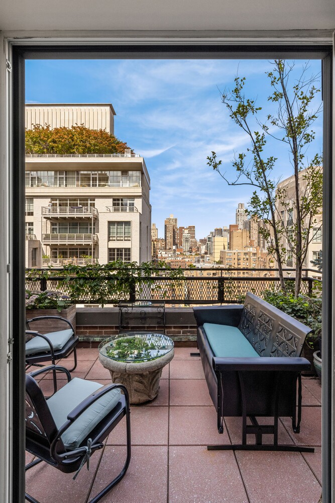 120 East 79th Street, Unit PH20 Manhattan, NY 10075 - Photo 19 of 20 a living room with furniture